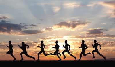 runners at sunset